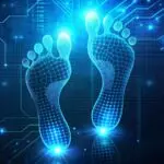 Glowing digital footprints on a dark technological background