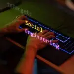Social engineering text in foreground screen covering hands of a hacker using an LED keyboard