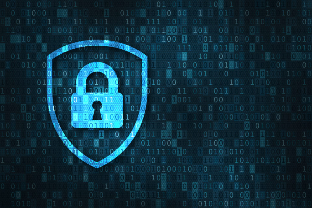A padlock on a shield on a binary digits background as a concept of cybersecurity