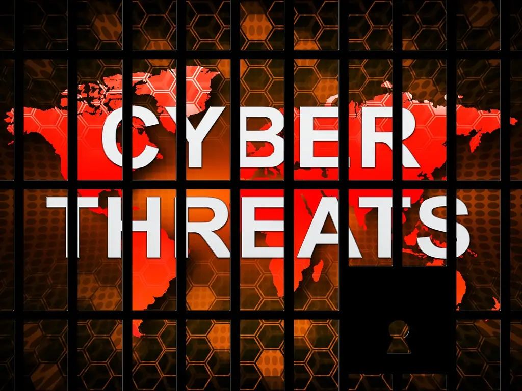 Cyber threats symbolical representation as writing on a world map behind prison bars