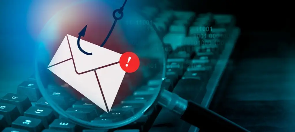 A symbolic representation of spear phishing, as an envelope with an exclamation point on a fishing hook hanging over a keyboard and seen through a magnifying glass